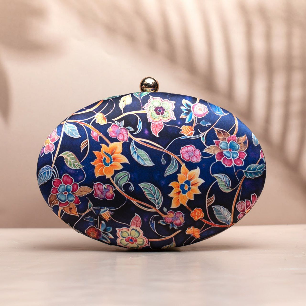 Kalamkari & Batik oval clutch