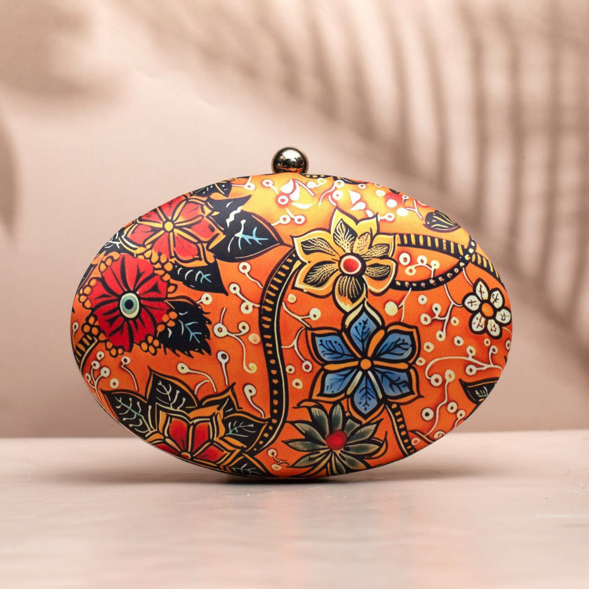 Kalamkari & Batik oval clutch