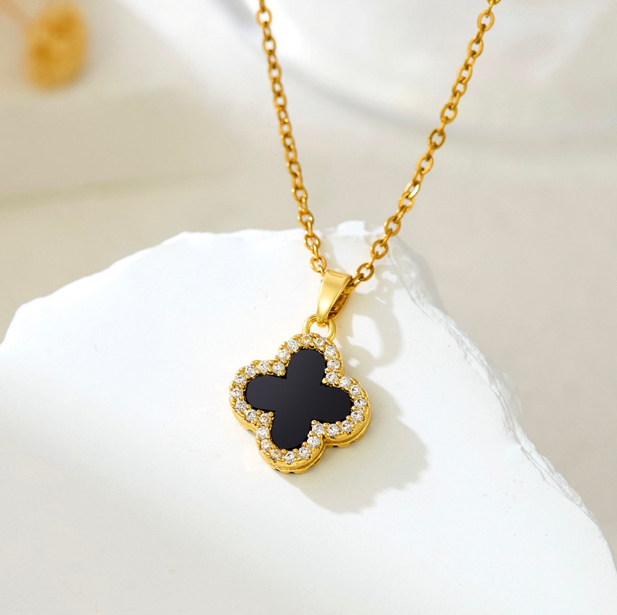 Black studded clover necklace